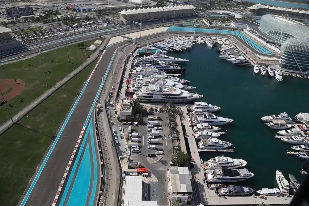 Aerial view of superyachts moored in the marina beside the Yas Marina Formula 1 circuit in Abu Dhabi.