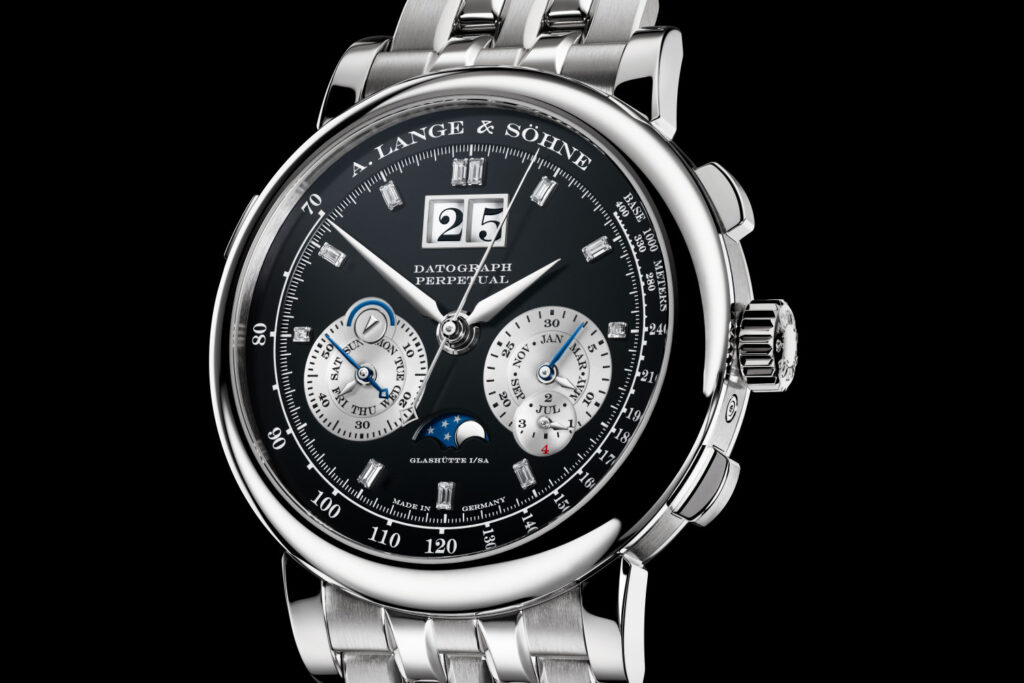 Close-up of an A. Lange & Söhne Datograph Perpetual wristwatch with a black dial and steel bracelet.