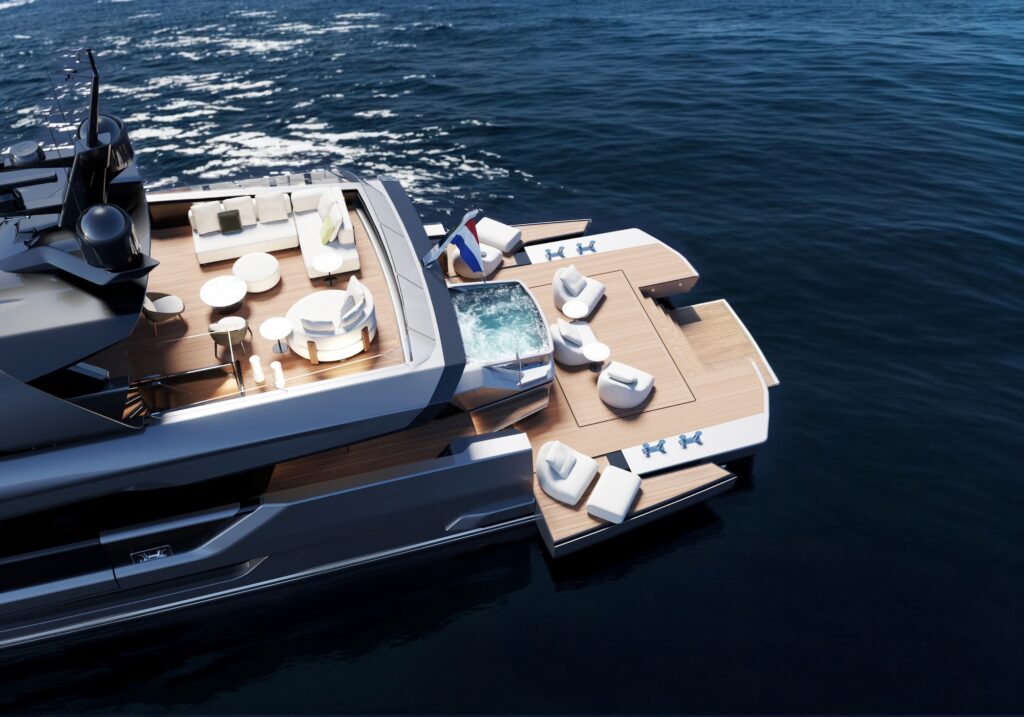 Overhead view of a yacht's rear deck with lounge furniture and a built-in jacuzzi pool.